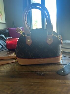 Louis Vuitton Monogram counterfeit Mini Alma in Brown with Tan & Red Trim